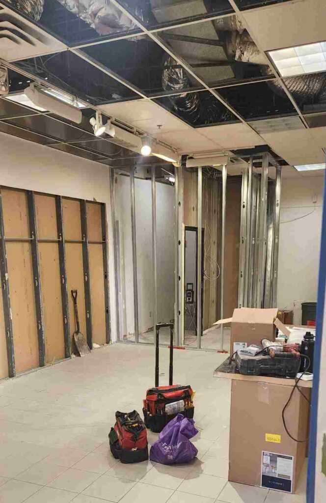Commercial new construction electrical rough-in and renovation work inside Toronto retail space